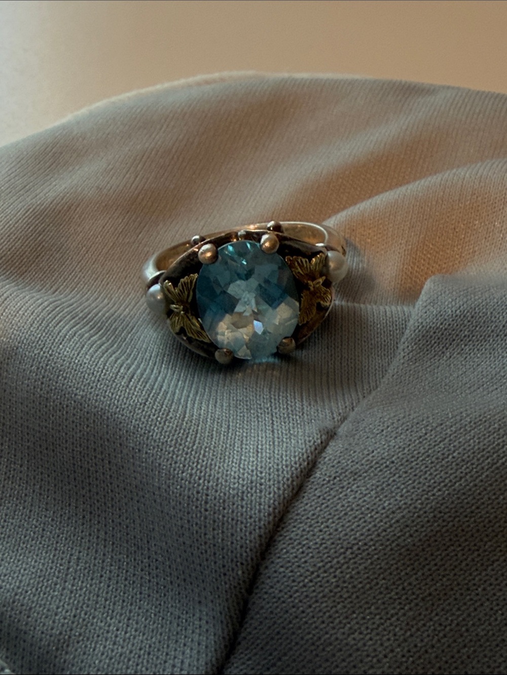 Blue Topaz-Style Silver Ring with Gold Leaf Accents